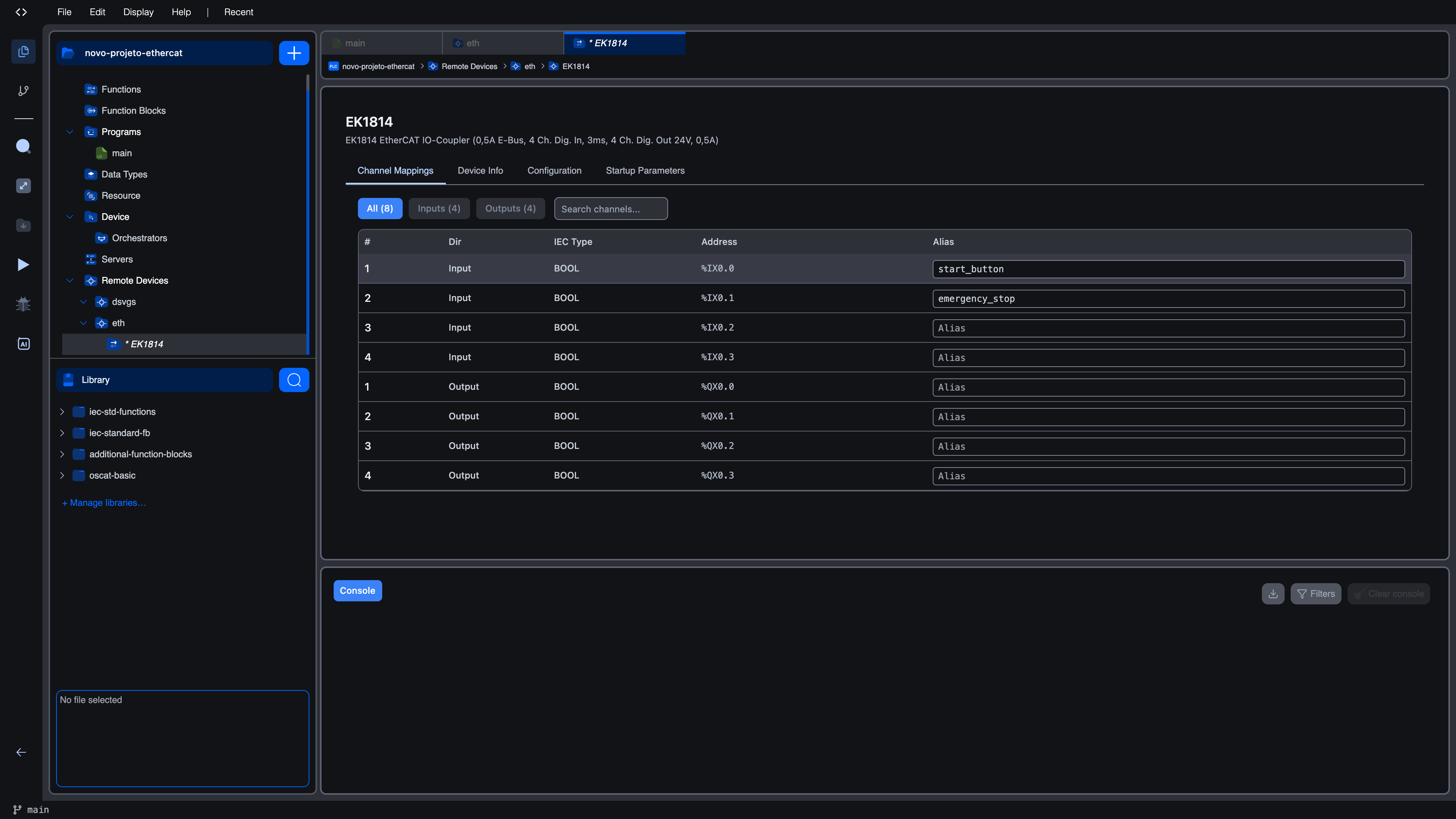 Channel Mappings tab with two aliases typed in: start_button on %IX0.0 and emergency_stop on %IX0.1; the remaining rows still show the empty "Alias" placeholder