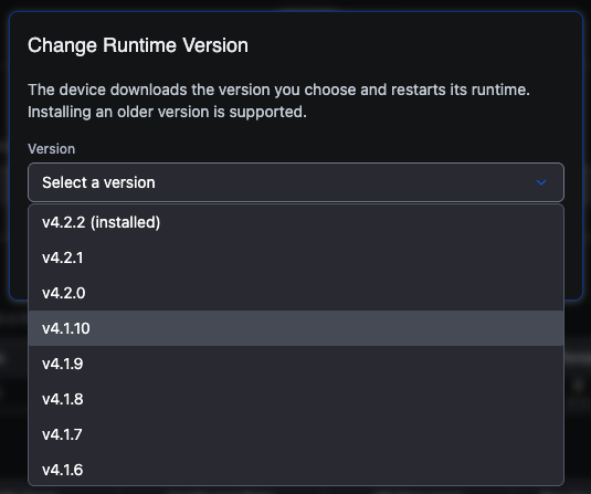 The Change Runtime Version dialog. It explains that the device downloads the version you choose and restarts its runtime, and that installing an older version is supported. A Version dropdown is open, listing v4.2.2 (installed), v4.2.1, v4.2.0, v4.1.10, v4.1.9, v4.1.8, v4.1.7 and v4.1.6